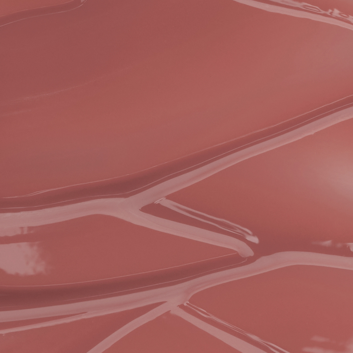 Close-up texture swatch of Muzigae Mansion Icy Glow Lip Gloss in 11 Tannin, showcasing its luminous glossy finish