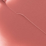 Close-up texture swatch of Muzigae Mansion Objet Liquid Lip Tint in Sequence 002, showcasing its smooth matte finish