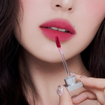 Muzigae Mansion Objet Water Lip Tint Celeb applied on lips, showing translucent, hydrated finish