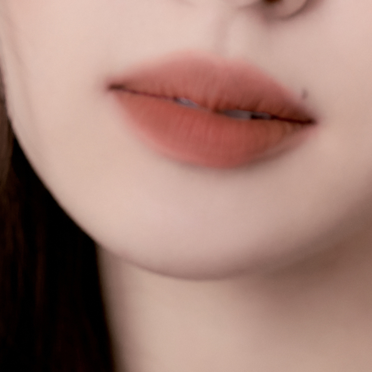 Close-up texture swatch of Muzigae Mansion Objet Water Lip Tint in Rare, showcasing its watery, smooth finish