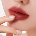 Muzigae Mansion Objet Liquid Lip Tint Chillin 007 applied on lips, showing smooth matte finish