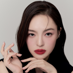 Model wearing Muzigae Mansion Moodwear Blur Semi-Matte Lipstick in 008 Revenge, demonstrating the shade in natural lighting