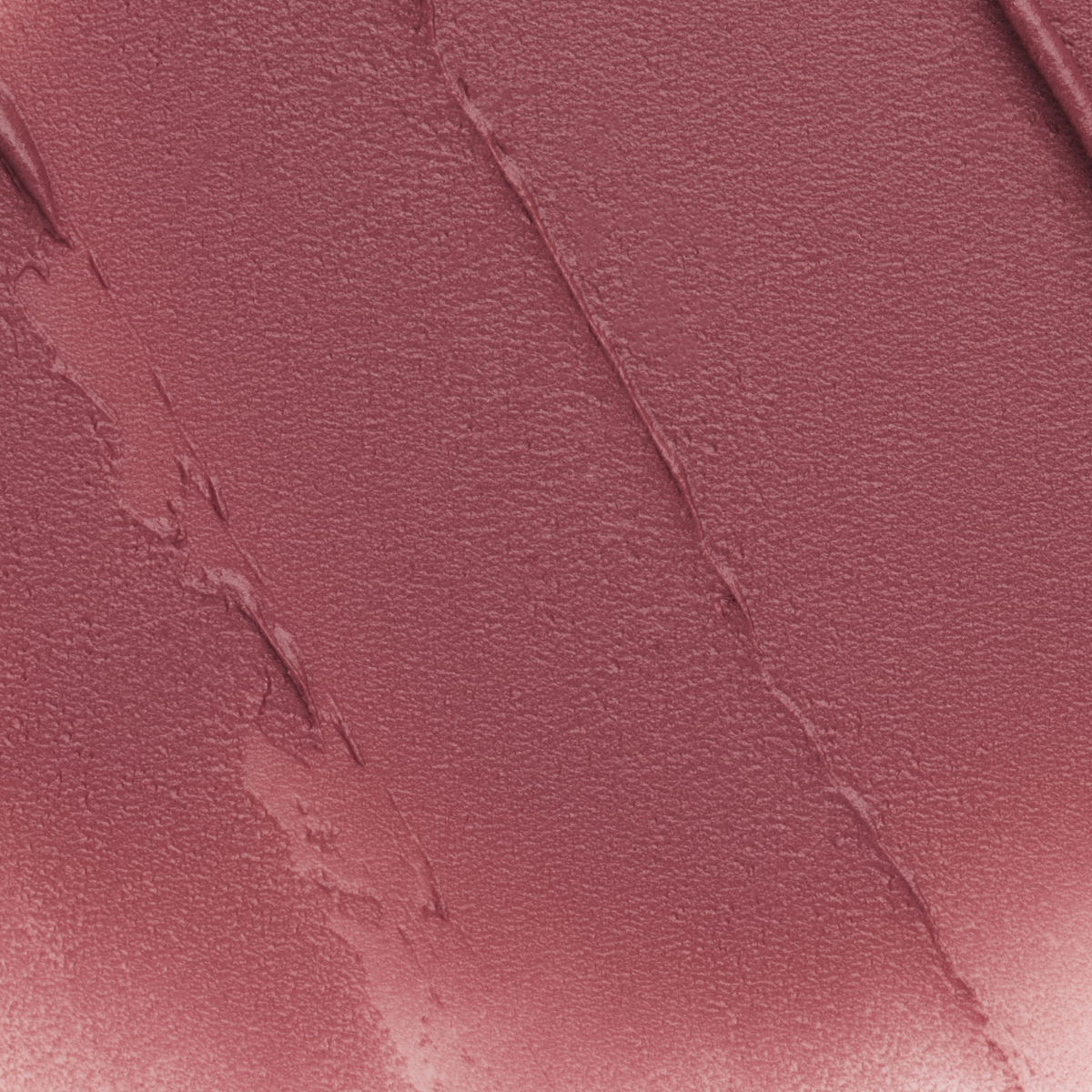 Close-up texture swatch of Muziage Mansion Objet Liquid Lip Tint in Appeal 013, showcasing its smooth matte finish