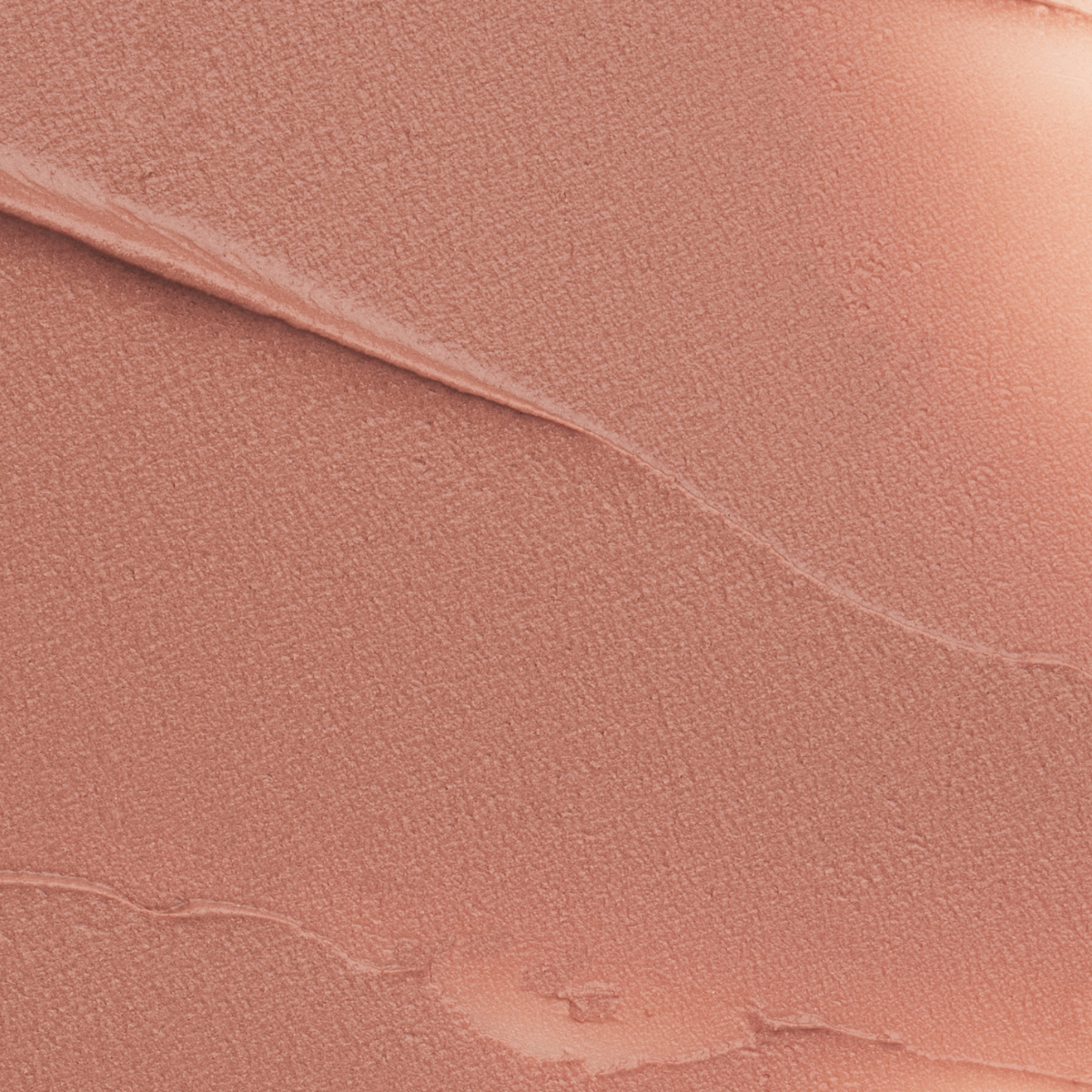 Close-up texture swatch of Muziage Mansion Objet Liquid Lip Tint in Tension 014, showcasing its smooth matte finish