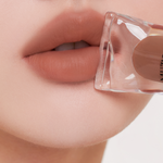 Muziage Mansion Objet Liquid Lip Tint in Pride 015 applied on lips, showing smooth matte finish