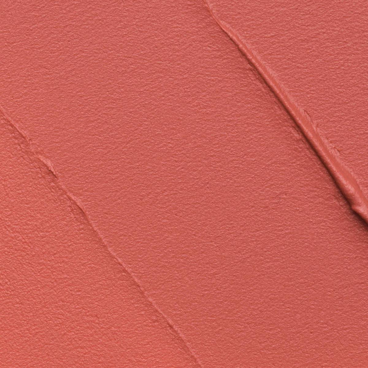 Close-up texture swatch of Muziage Mansion Objet Liquid Lip Tint in Melted 021, showcasing its smooth matte finish