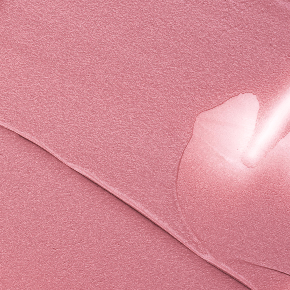 Close-up texture swatch of Muziage Mansion Objet Liquid Lip Tint in Dawn Rose 023, showcasing its smooth matte finish